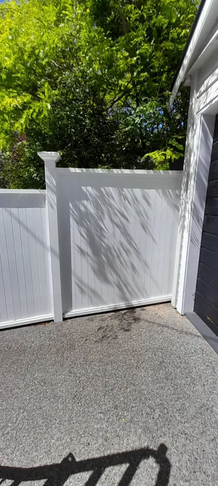 White PVC fencing around a Wellington home